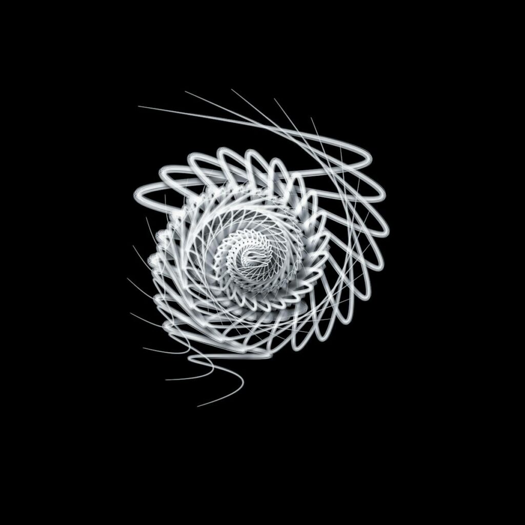 Intricate spiral abstract art with a black background, showcasing dynamic motion.