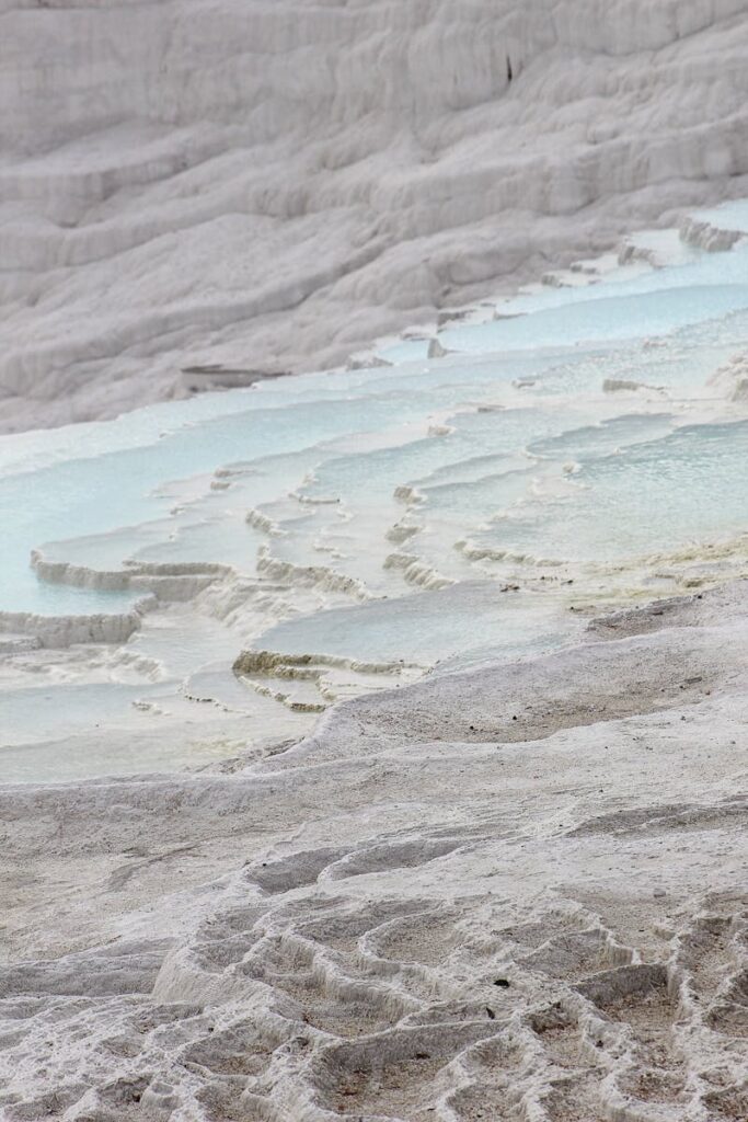 Beautiful terraced hot springs in Pamukkale, Turkey, showcasing travertine pools.