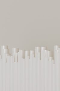 Abstract skyline comprised of cylinders and lines.