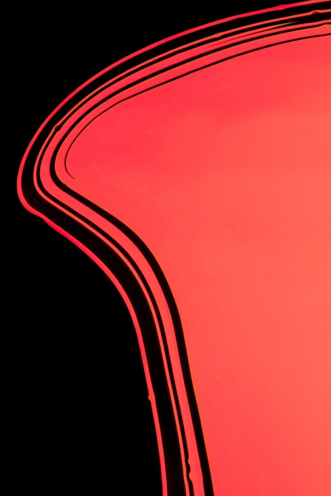 Red gradient with black lines and background.