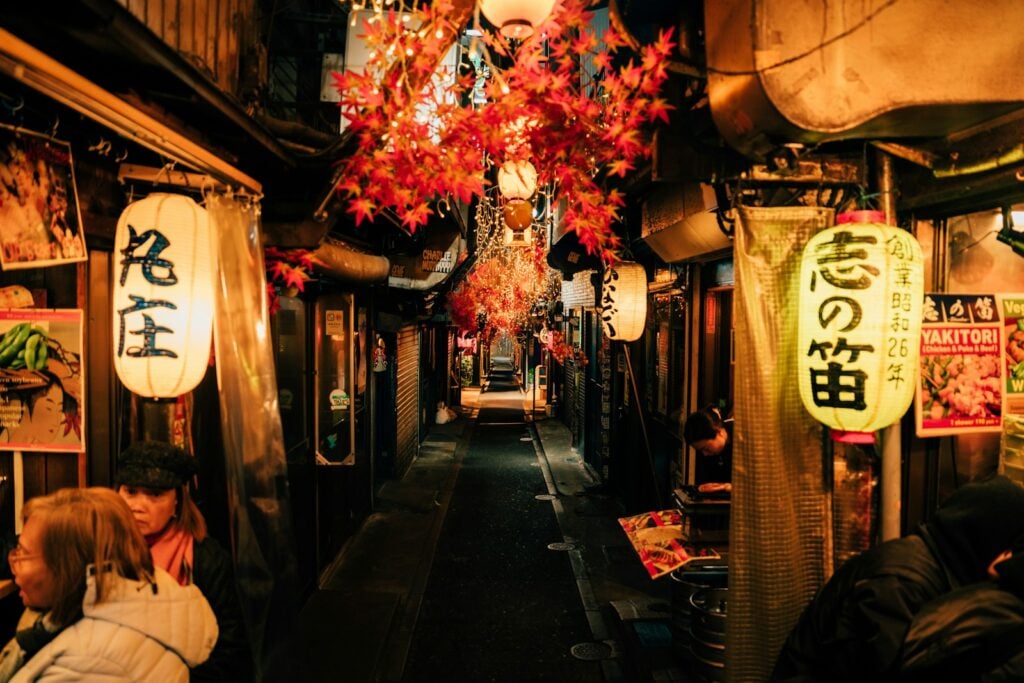Cozy, lantern-lit alleyway in japan.