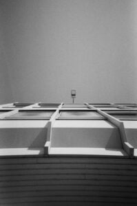 Building's facade and the clear sky.